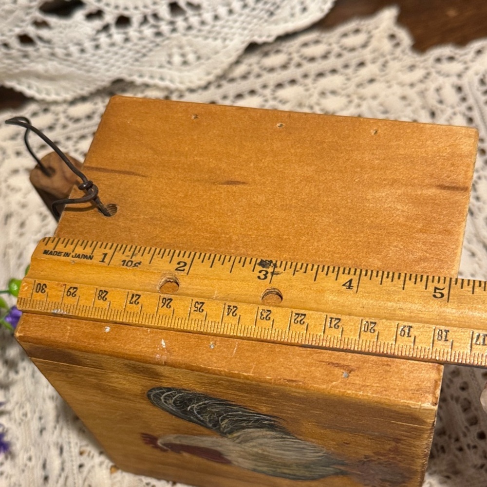 Wooden Container with a rooster holding Purple and Green Faux Flowers. - Picture 8 of 12